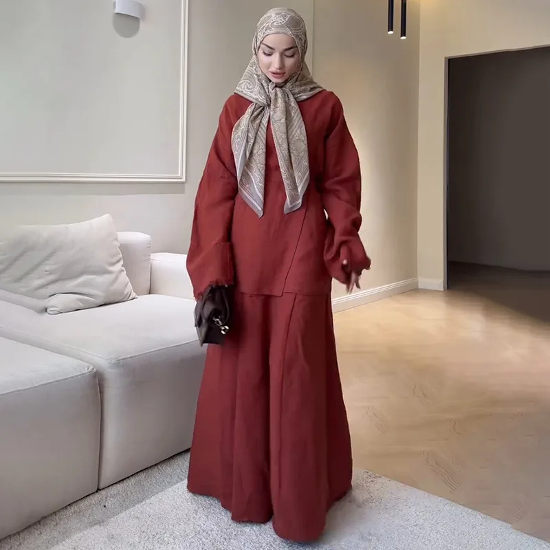 

2025 women's new solid color long-sleeved strap top long skirt casual suit Z062