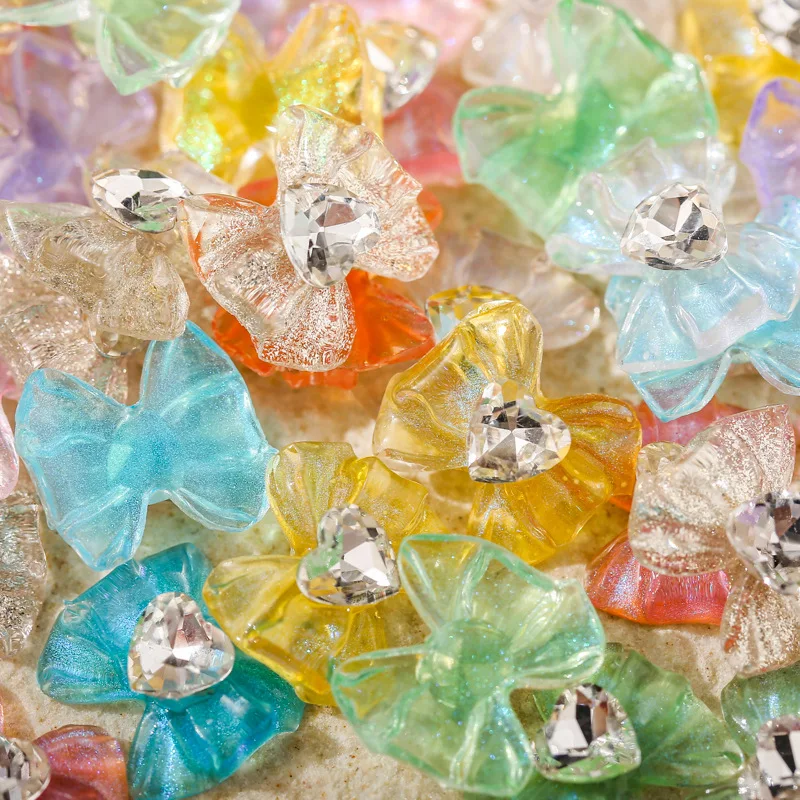 10 pz/lotto Ice Clear Nail Art Bow Charms Con Cuore Strass Gemma di Cristallo Trasparente Glitter Bowknot Unghie Decorazione Accessorio