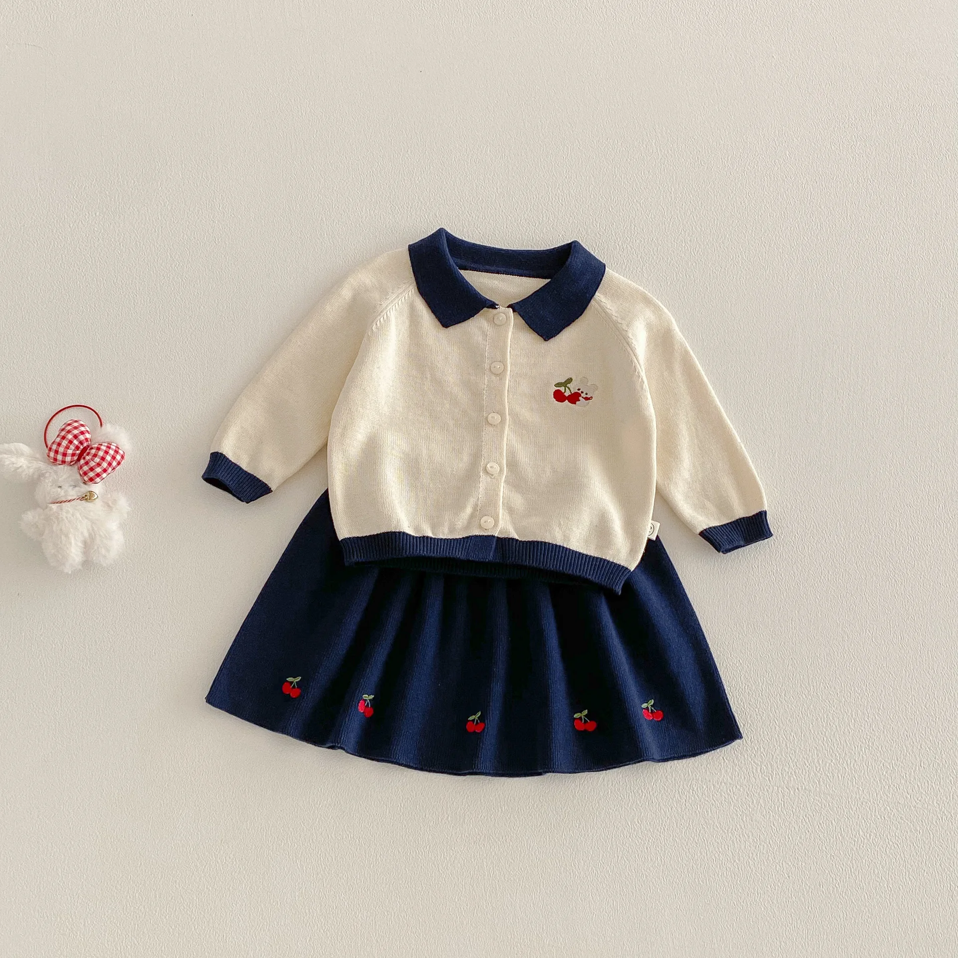Girls' College Style Set 2026 New Spring Baby Cherry Knitted Sweater Cardigan Sweater Half Skirt Two-piece Set