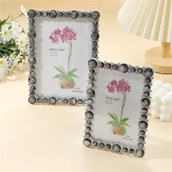Black natural shell photo frame. Can store 6-inch/7-inch photos, suitable for room decoration, Halloween and Christmas decoratio