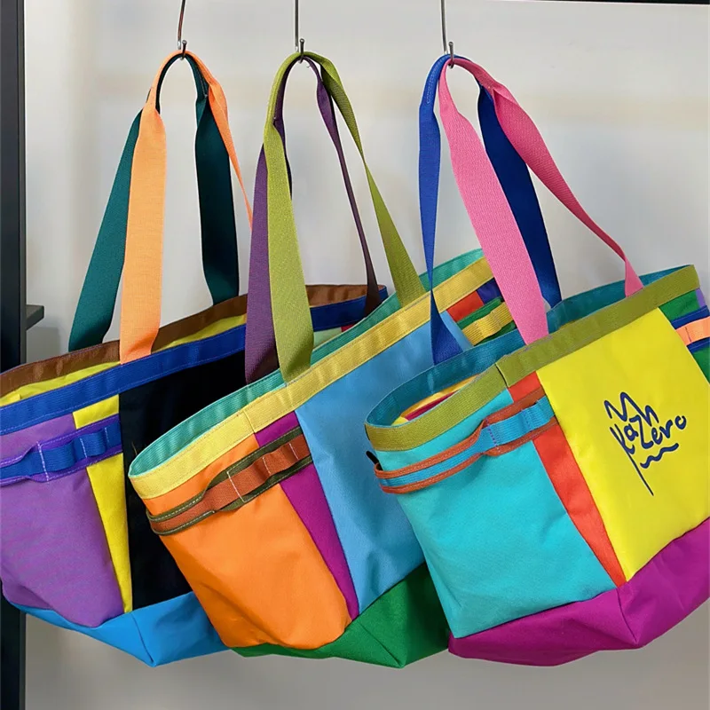 Color splicing canvas tote bag women's 2026 new lightweight shoulder bag large capacity outdoor hand carry travel bag