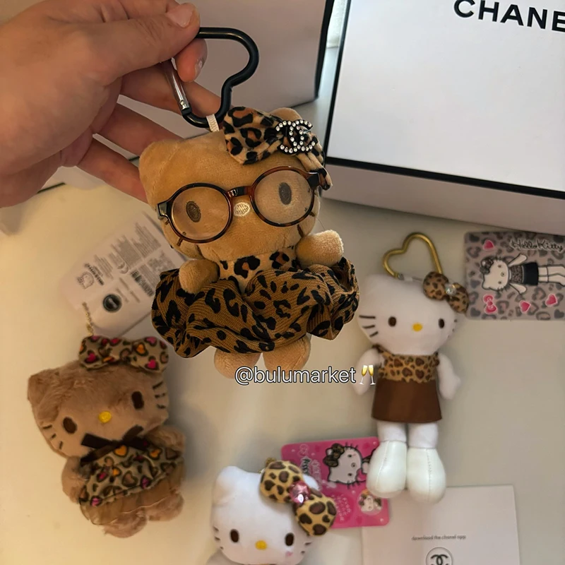 سانريو مرحبا كيتي الجلد الداكن أفخم المفاتيح Kawaii بلوشي محشوة اللعب دمية قلادة لحقيبة الظهر محفظة الفتيات حقيبة الملحقات