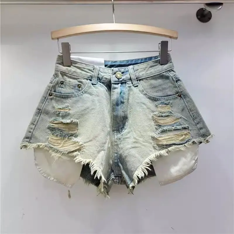 تسرب جيب الشارع هول غسلها الرجعية الأزرق الدنيم السراويل 2025 صيف جديد التوابل فتاة موضة الجينز السراويل الساخنة السراويل النساء