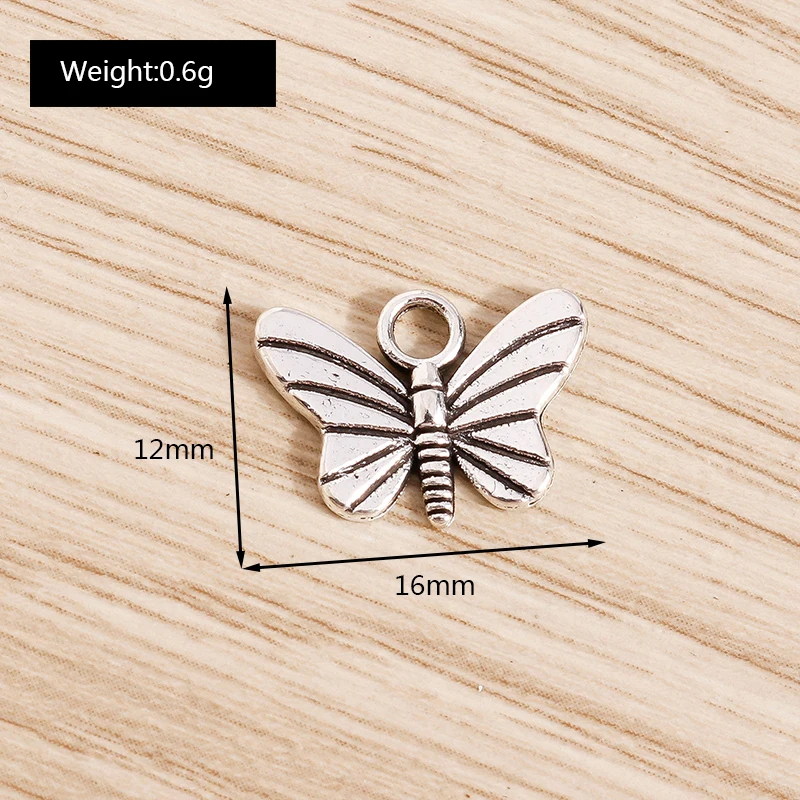 Tusember 50 Stück Legierungs-Tieranhänger Taube Katze Schwan Schmetterling Dinosaurier Muschel-Anhänger für Armbänder Halsketten DIY Schmuckherstellung – Detail 9