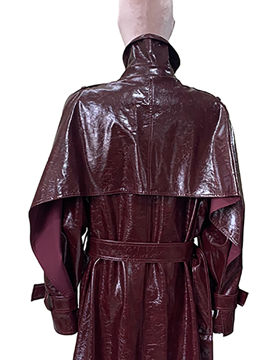Trench lungo in ecopelle riflettente lucido autunnale per donna Cintura increspata Abiti eleganti di moda europea di design di lusso