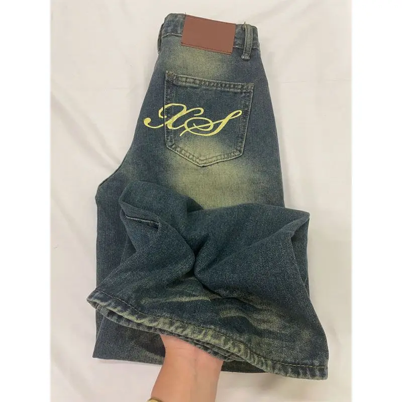 Jeans a gamba dritta lavati alla moda da uomo e da donna in stile street retrò americano per la primavera nuovi pantaloni casual larghi e casual da pavimento