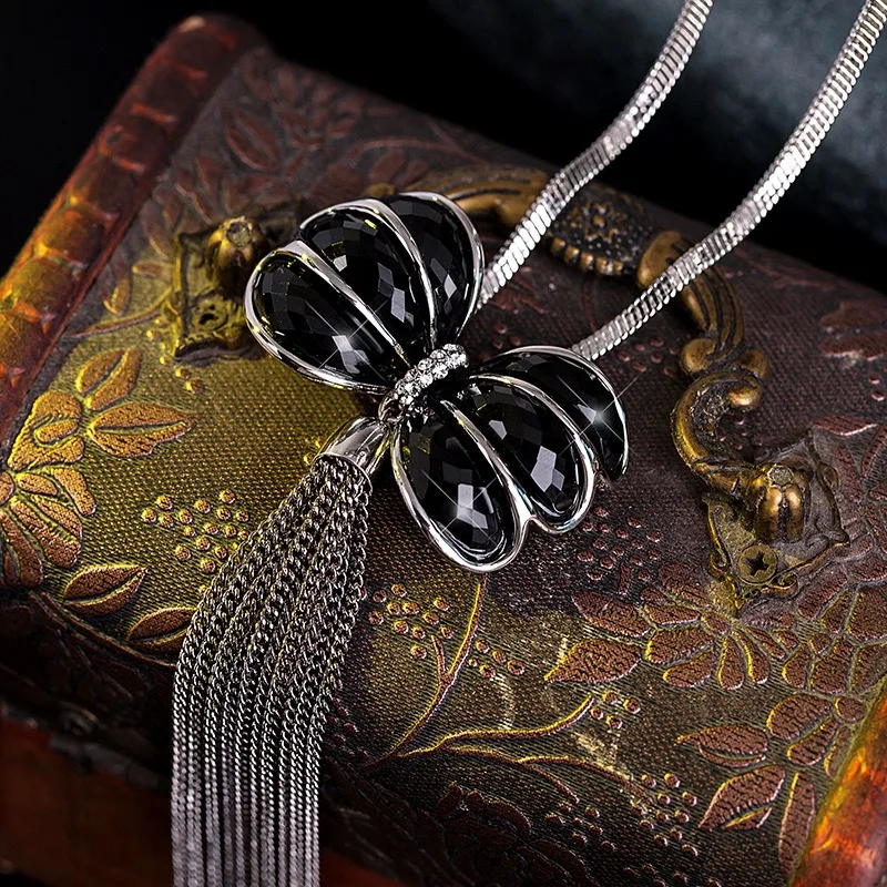 

Bow tassel high-end sweater chain for women, long snake bone chain sweater necklace