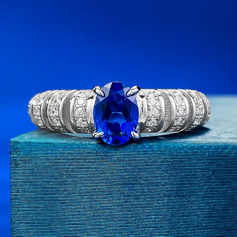 The new S925 sterling silver oval sapphire 5 * 7mm denier ring is a grand, luxurious and personalized hot selling accessory