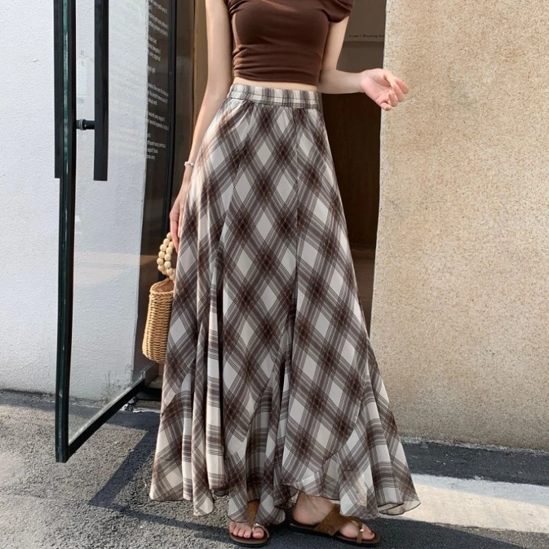 

Qiukichonson Long Skirts Women Plaid Skirt 2026 Goth Spring Summer High-Waisted Ruffles Asymmetrical Pleated Skirt Maxi rokken