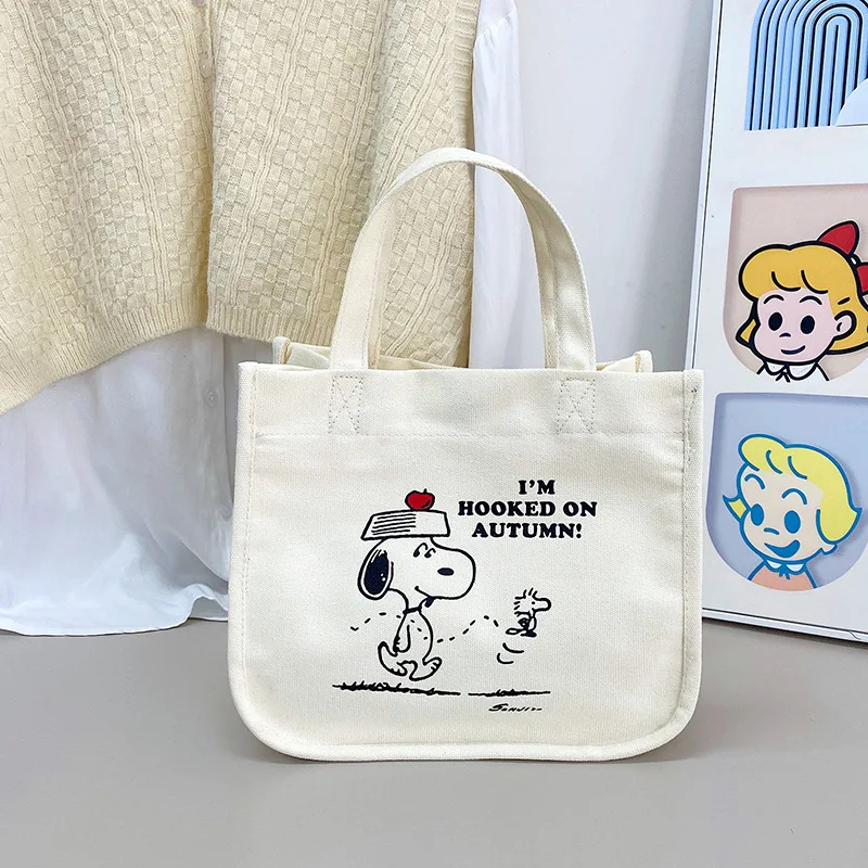 MINISO Disney Serie Snoopy kreskówka płótno z nadrukiem torebka torba damska torba ładny telefon torba Bento małe torba kwadratowa