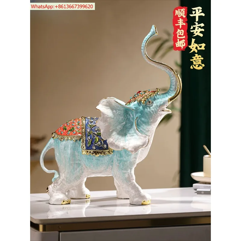 A pair of trumpets, enamel and auspicious elephant ornaments