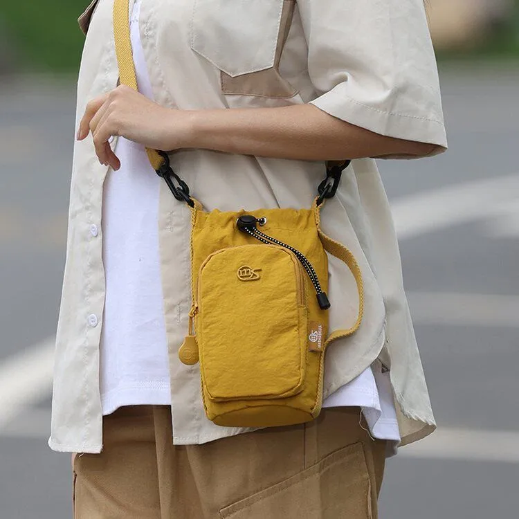 bolso-bandolera-pequeno-para-mujer-ligero-de-nailon-para-telefono-simple-marca-massha-family-con-correa-de-hombro-para