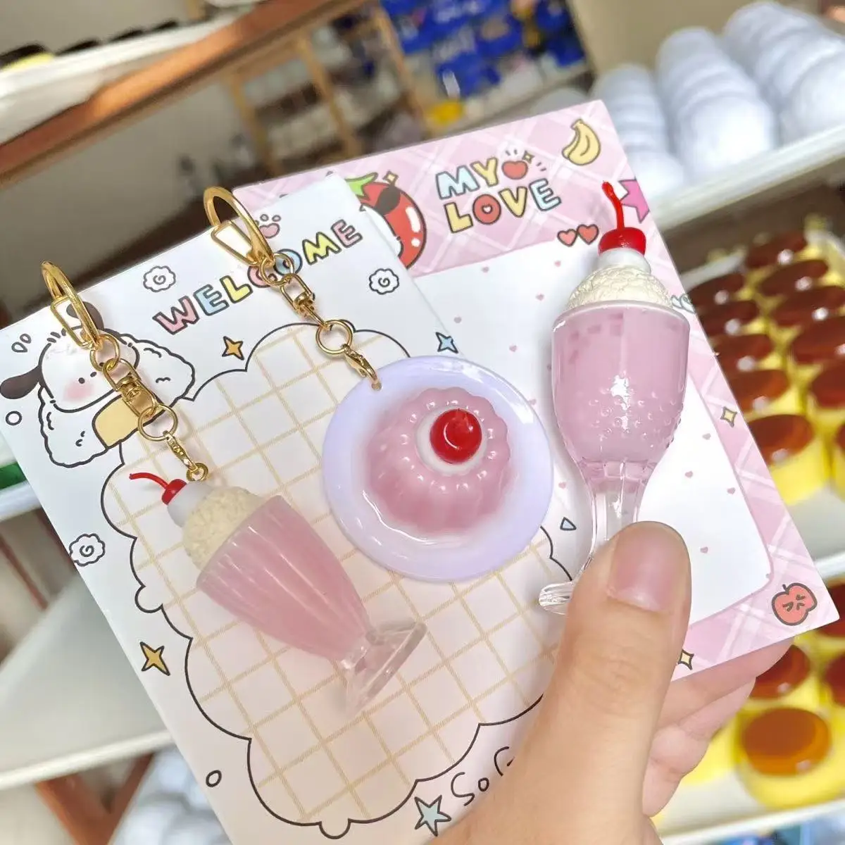 Rosa crema Soda agua nieve montaña leche gelatina pudín llavero colgante ornamento tridimensional alto valor lindo 2D