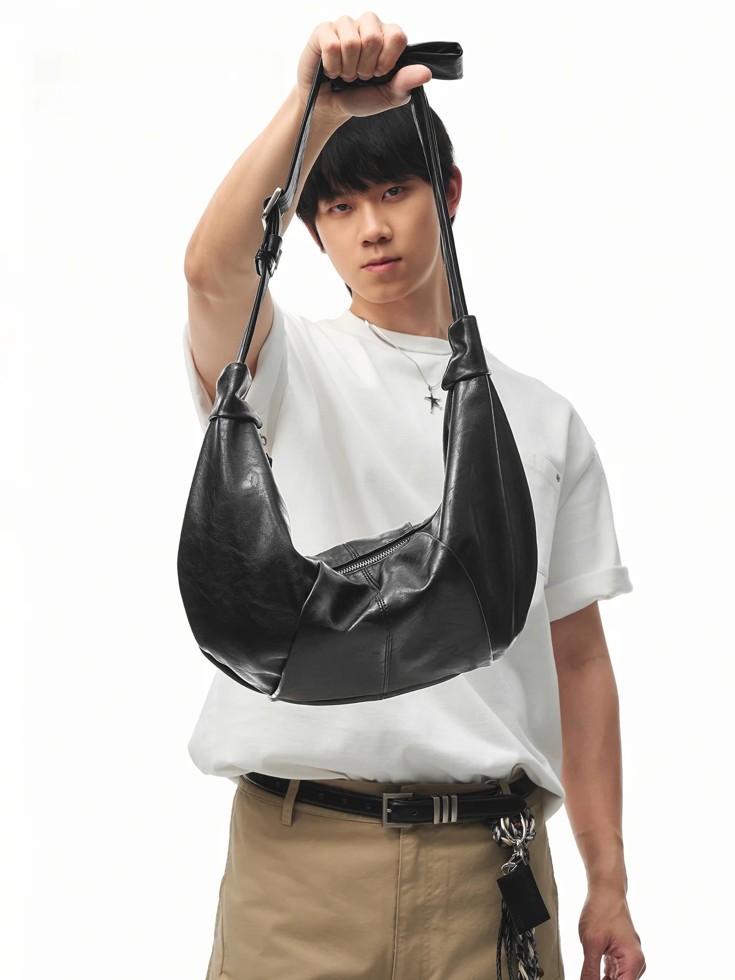 

Nesbit Casual Leather Crossbody Bag for Men with Folded Design Summer 2026 Moon Shape Black Cow Horn Style Youth Satchel