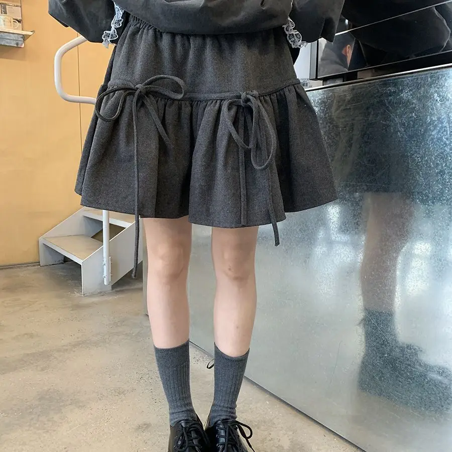 

Gagaok Woman Skirt 2025 Spring New Elastic High Waist Mini Skirts Streetwear Bow Tie Simple Solid French Style Women Clothes