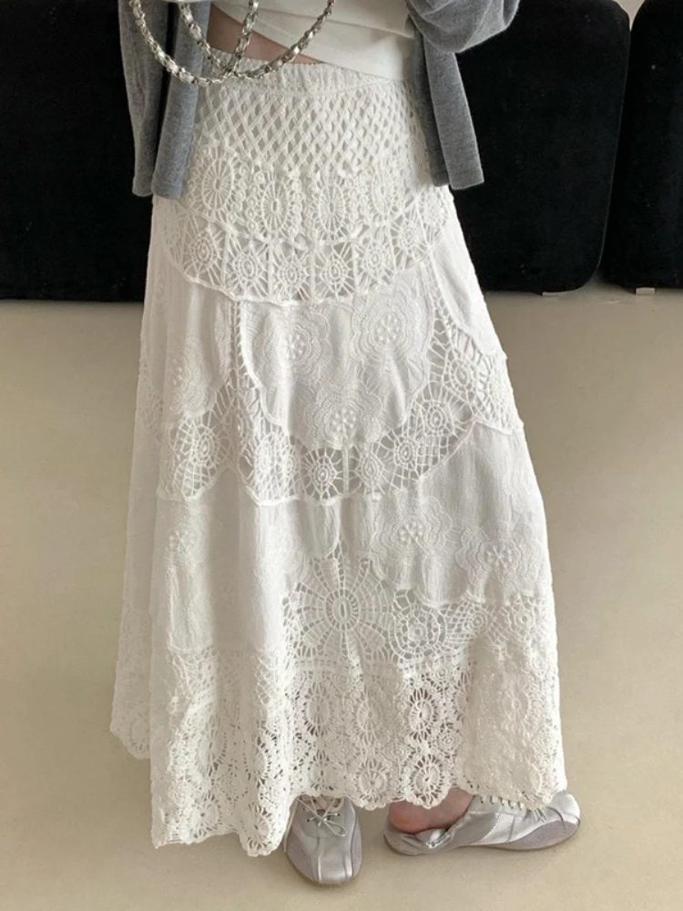 2025 novo no verão design de moda nicho damasco saias boêmio estilo férias cor sólida rendas gancho flor midi saia para mulher