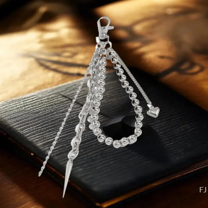 سلسلة مفاتيح أنيقة بشرابة فاسق للجنسين؛ معدن مستدير من الخرز الفضي؛ ملحق بإبزيم حزام الزوجين وديكور الحقيبة.