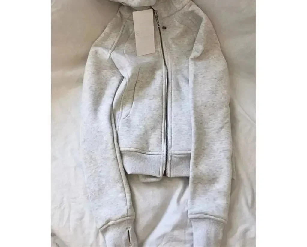 

Trendy yoga wear solid color hoodie version casual versatile loose zipper short long-sleeved jacket for women