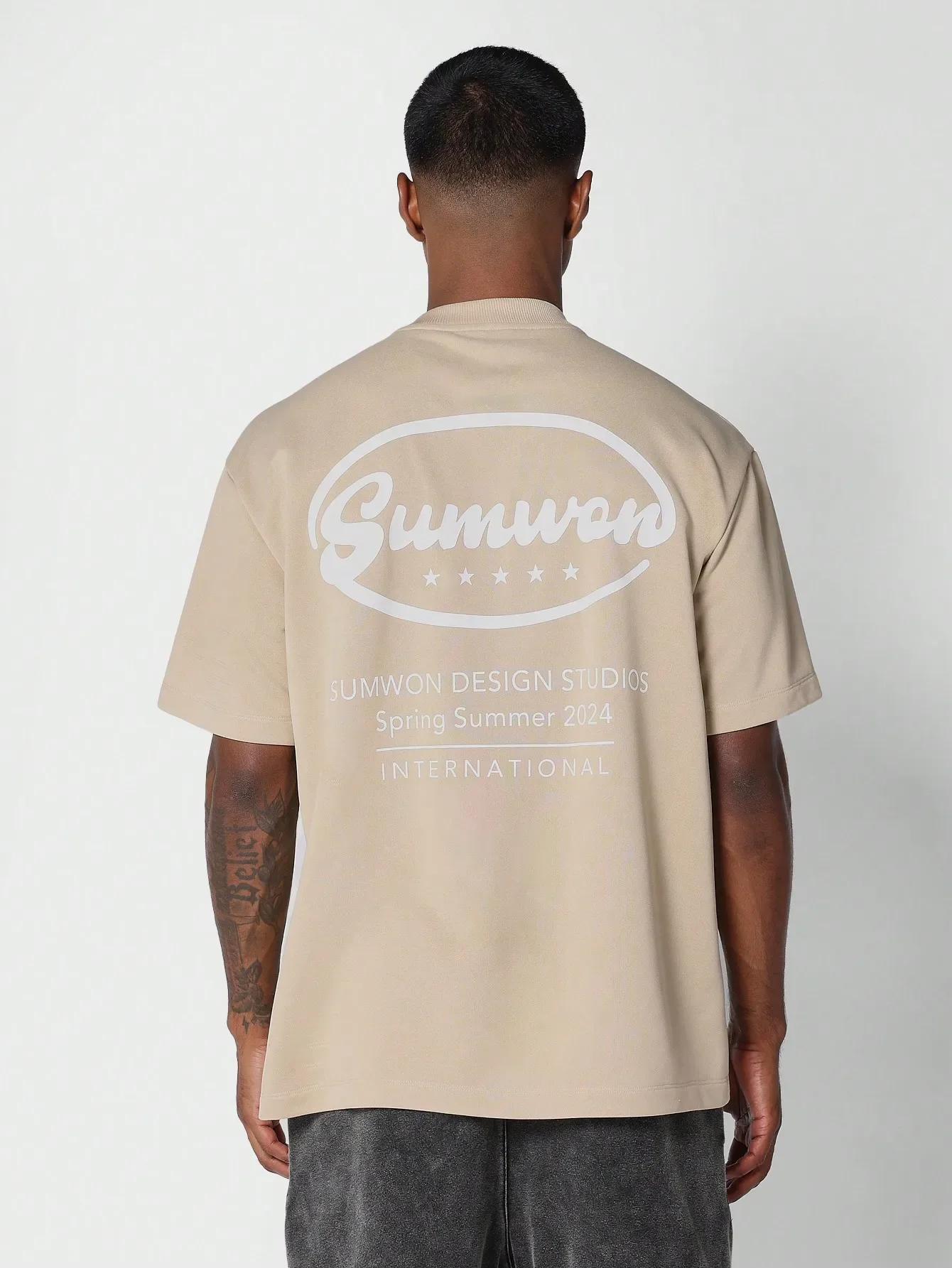 SUMWON regular style short sleeved T-shirt with printed patterns on the front and back