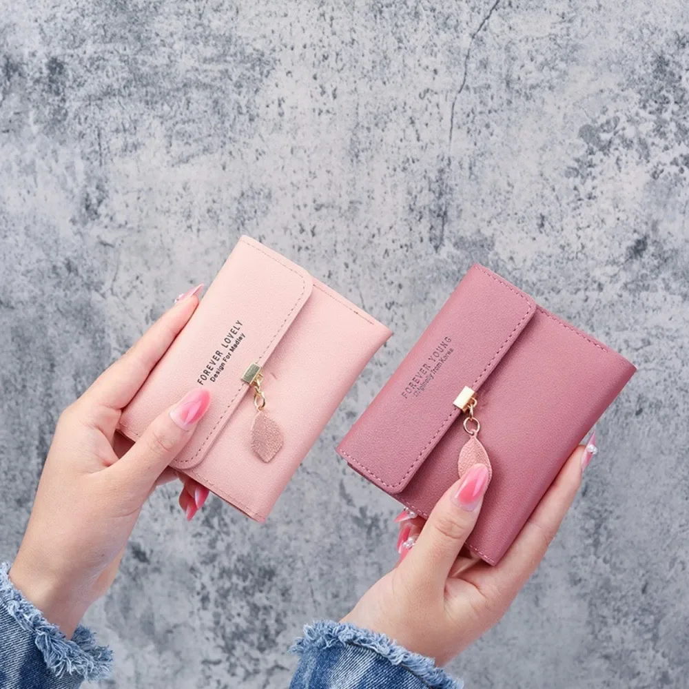 Neue koreanische Version der einfachen kleinen Brieftasche, dreifach gefaltetes Münzbit, Geldscheinklammer, Münzgeldbörse, grenzüberschreitende kurze Damenbrieftasche