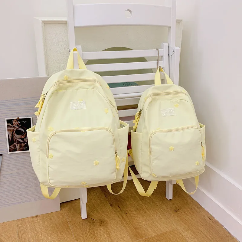Japanese StyleinsSolid color simple backpack for women, stylish and lightweight school bag for middle and high school students,