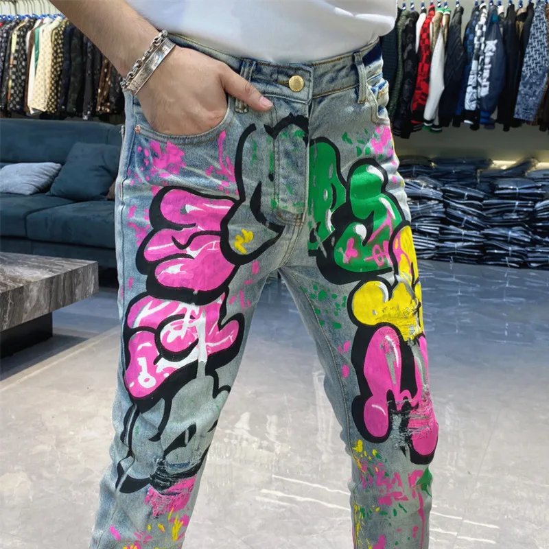 

Graphic Jeans Motorcycle Skinny Jeans Men High Street Graffiti Print Jeans Hip Hop Trendy Hole Color Printing Stretch Jeans Men