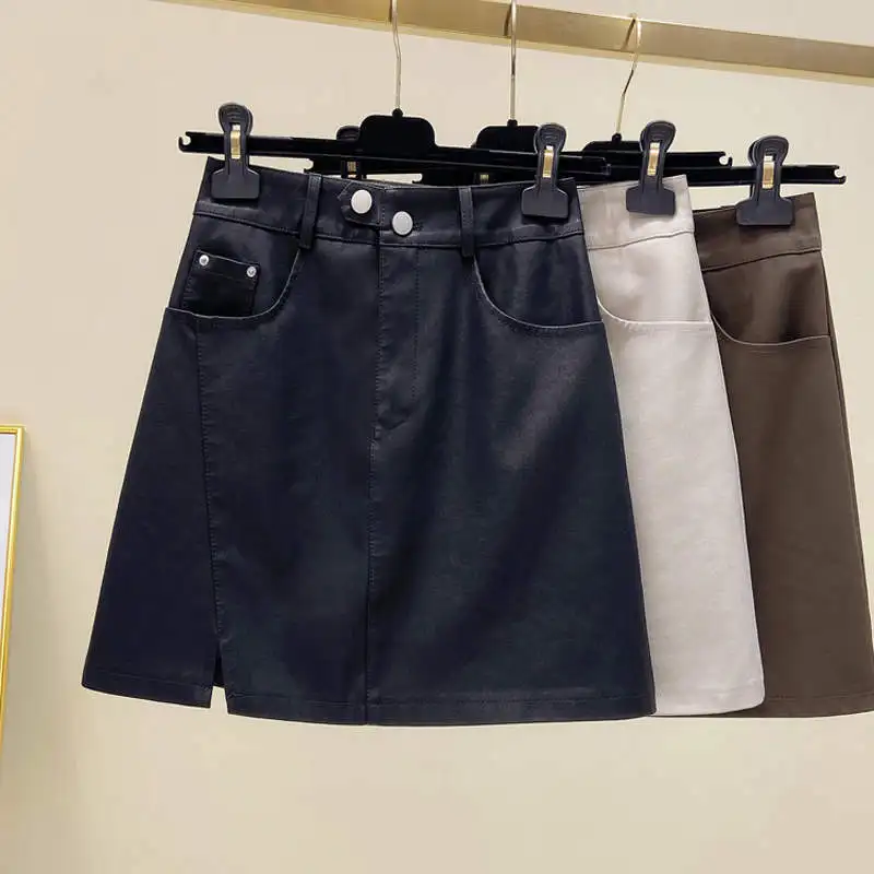 

PU Leather Skirt Female Autumn Slim High Waist Black Sexy Short Mini Skirts Womens Streetwear Fashion Bandage A-Line Skirt C7790