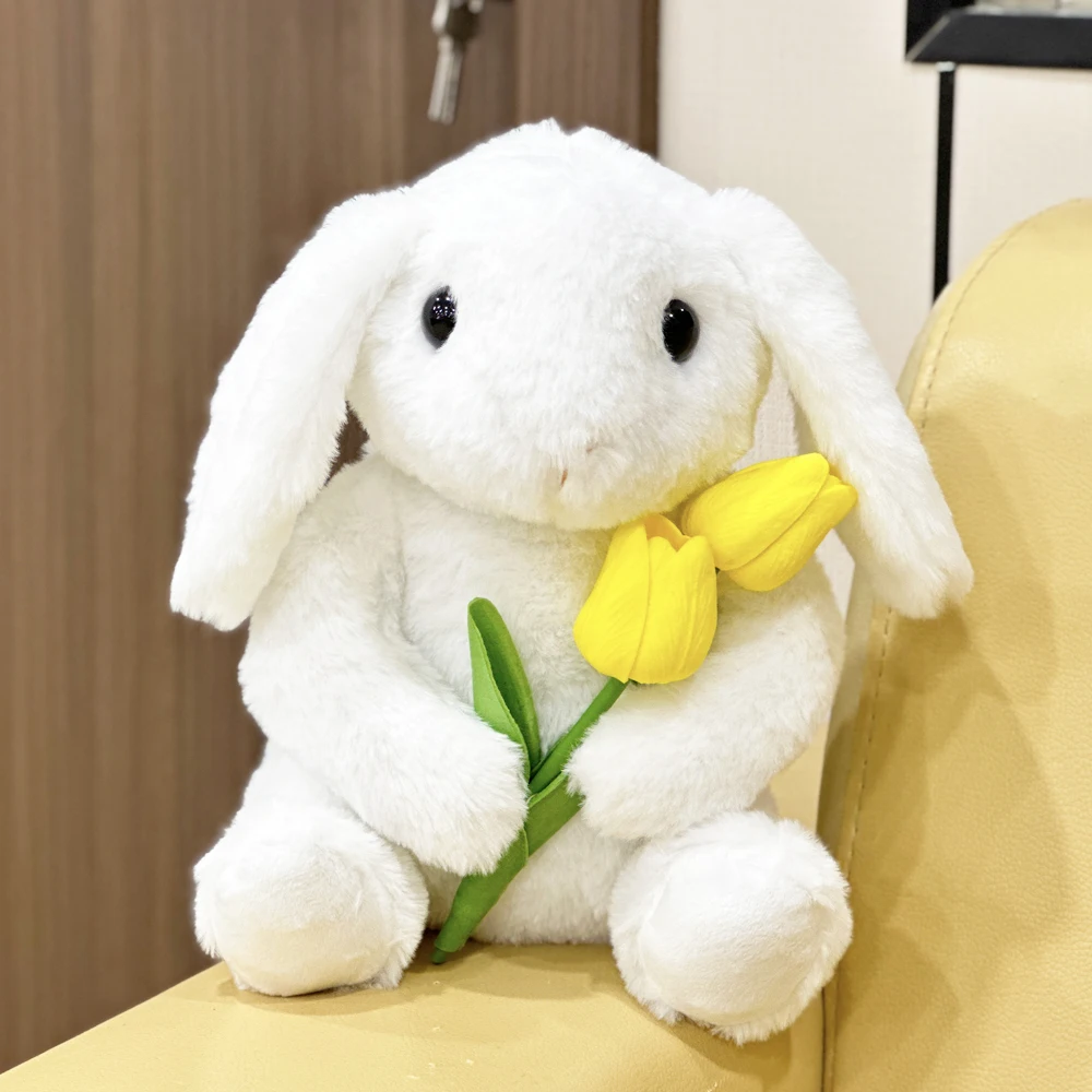 Peluche di coniglio bianco con fiori di tulipano