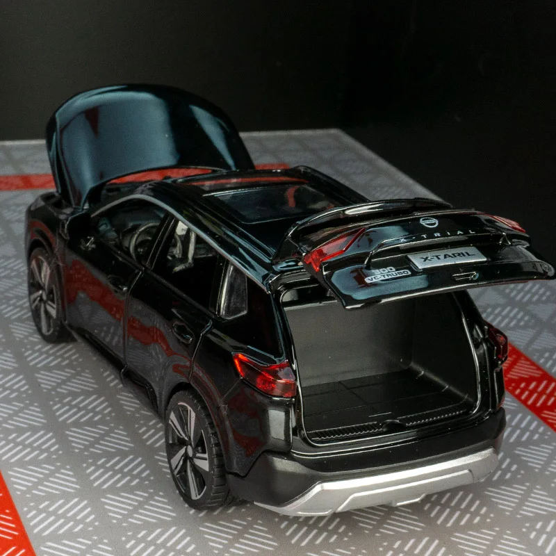 Modelo de vehículo todoterreno de aleación Nissan x-trail 1:32, puerta de juguete para niño extraíble y el maletero del capó se puede abrir como regalo