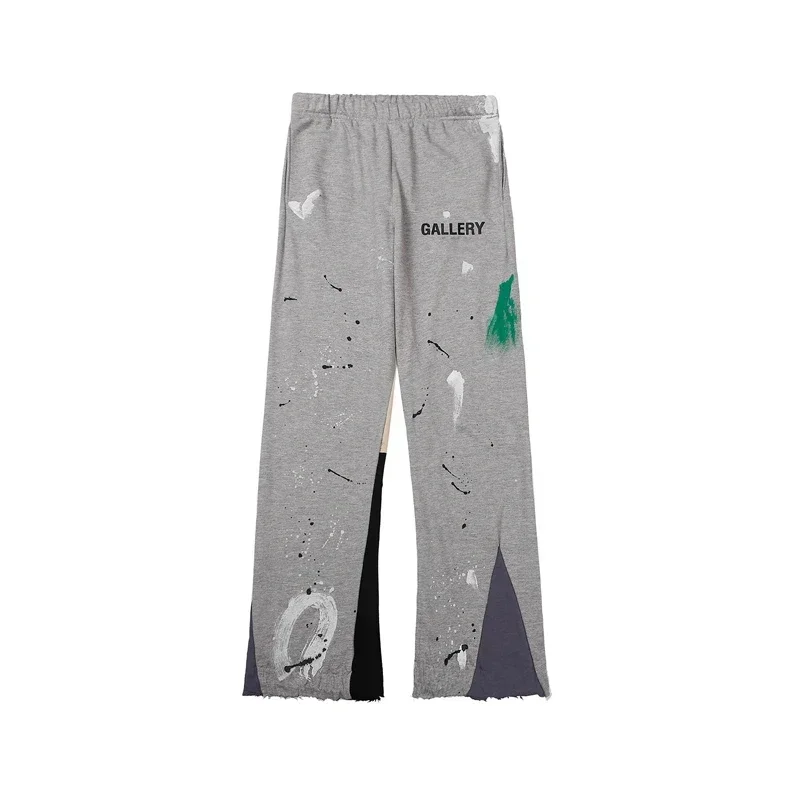 Men's sweatpants from a fashion brand are classic style splashed with graffiti, letter print, and loose slacks