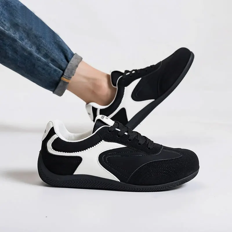A pair of black trendy niche men's shoes, four season new versatile sports and leisure shoes, height increasing board shoes