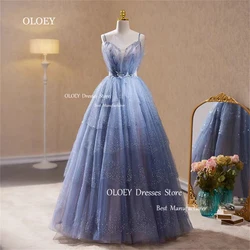 OLOEY Shiny Blue Evening Dress A Line Floor Length Beading Crystal Party Dress Spaghetti Straps Sweetheart Sleeveless Formal