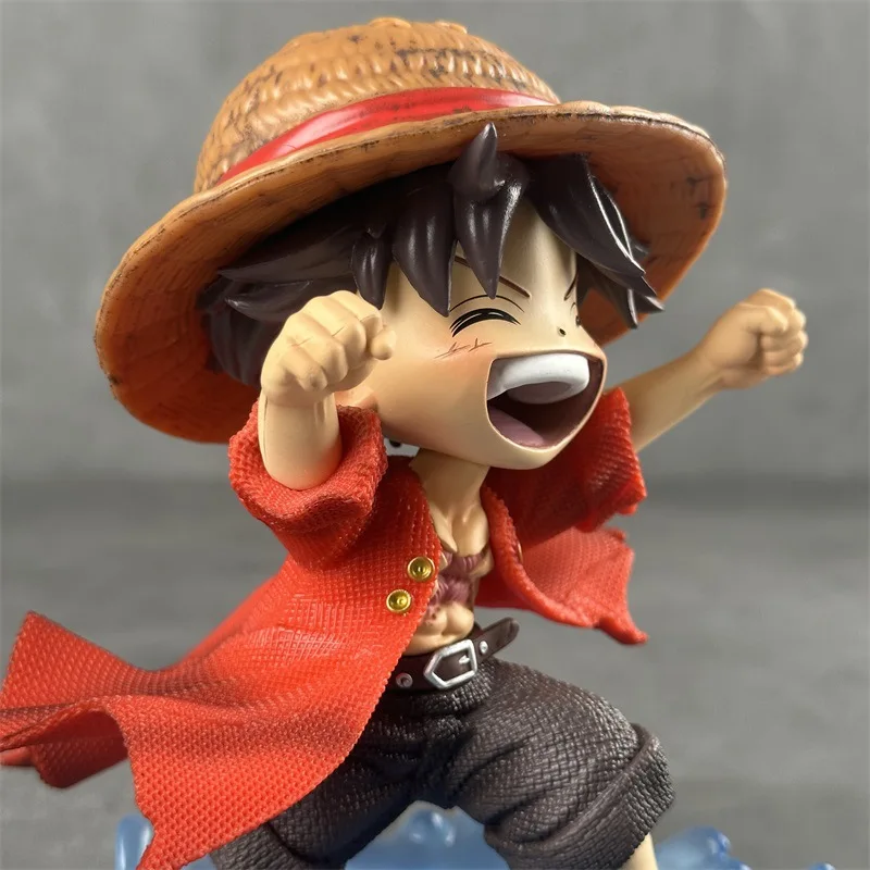 16 cm One Piece Ruffy Kindheitsfigur Shuiyue-Stil Lachender Ausdruck Blaue Wassereffektbasis PVC Anime Schreibtischdekoration Geschenk für Fan