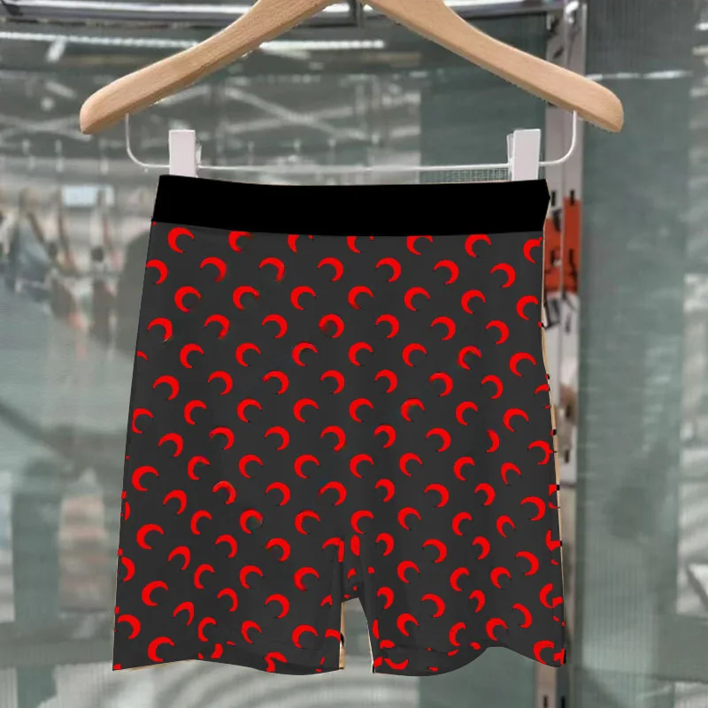 [black and red moon shorts] black pants