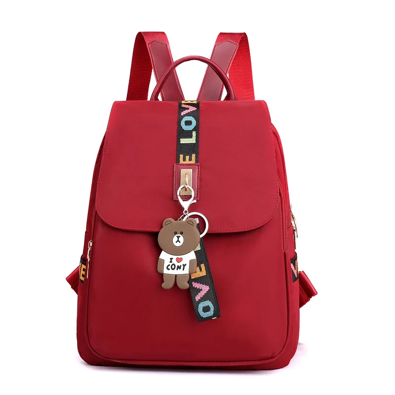 حقيبة ظهر عصرية بسيطة لعام 2025 بسعة كبيرة من قماش أكسفورد خفيفة الوزن حقيبة كتف للسفر على طراز الشارع كاجوال بلون نقي