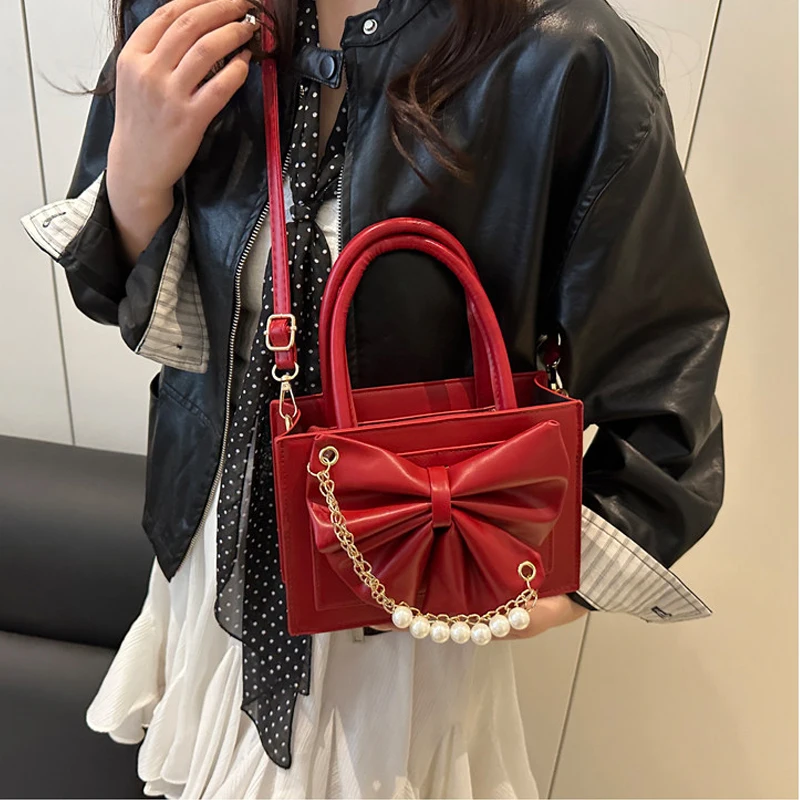 Fashionable Bow Knot Pearls Chains Women's Handbags 2026 New Vintage PU Leather Wedding Bag Korean Sweet Female Crossbody Bags