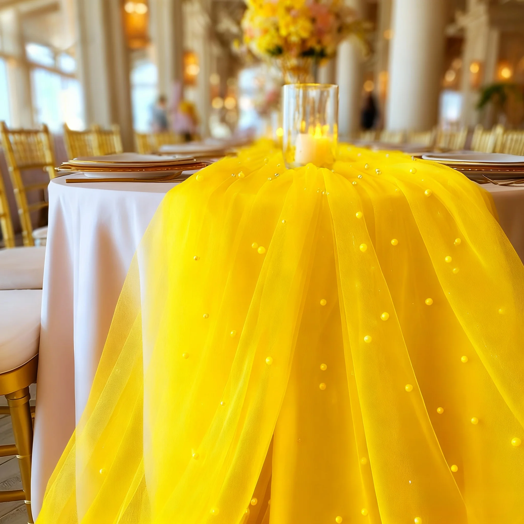 One elegant yellow pearl tulle tablecloth, suitable for wedding tables and dessert tables, perfect for festive decorations.