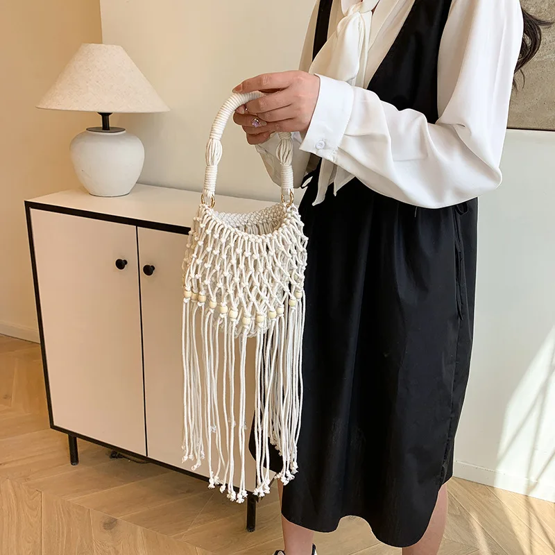 

Fabric Tassel Designer Crossbody Bags Hollow Out Exquisite Bags Female 2025 High Quality Large Capacity Vacation Handbags