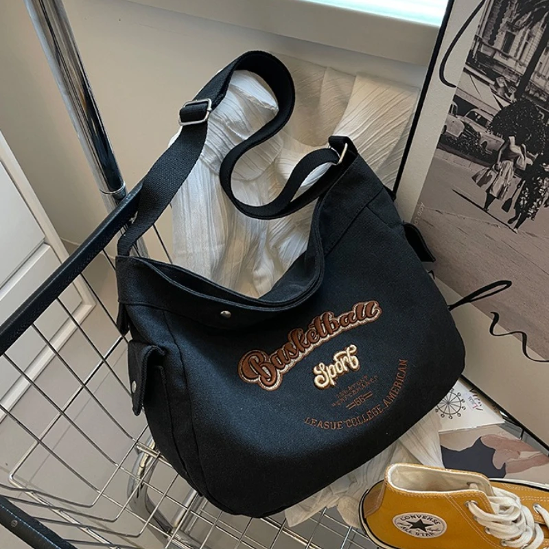 2025 Nuova borsa a tracolla in stile coreano: borsa in tela con stampa di lettere, spaziosa e leggera, perfetta per la scuola, il lavoro e lo shopping