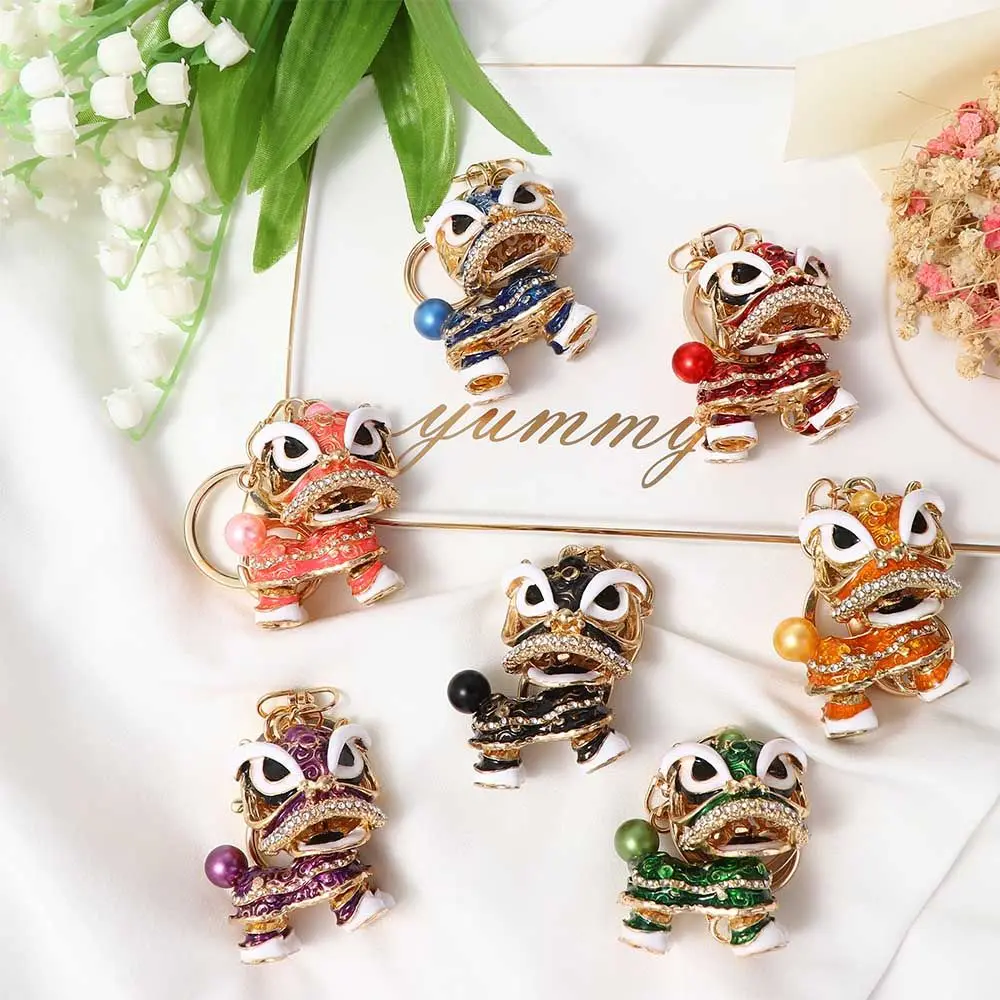 مفتاح حامل المهرجان الصيني التقليدي استدارة الرقص الأسد المفاتيح سيارة مفتاح سلسلة كريستال الرقص كيرينغ محفظة قلادة