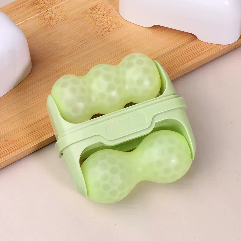 Rouleau de glace pour le visage à Double tête, utilisé pour le massage du visage et de la tête, en matériau en résine, sans parfum ni batterie