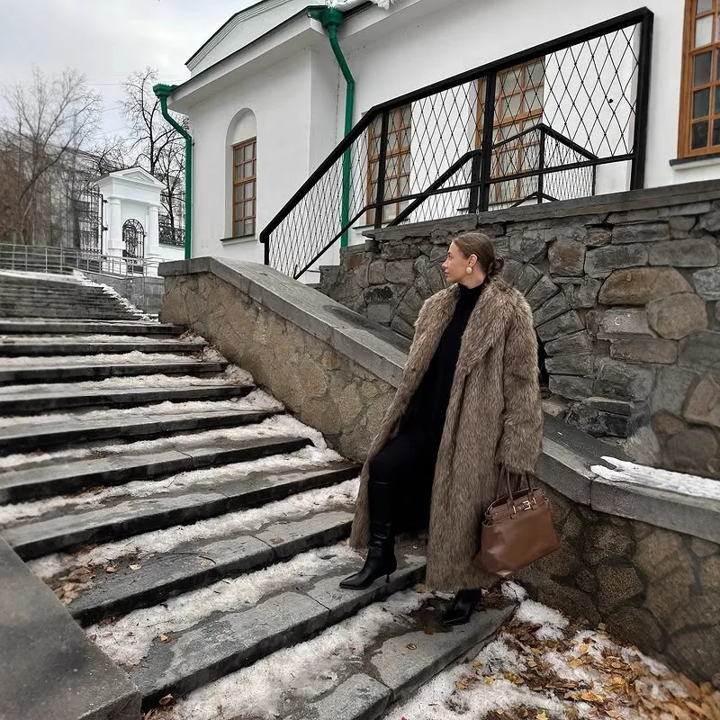 A new long coat in apricot red, a faux fur coat, a thickened winter warm outerwear in brown and coffee color, and an extended st
