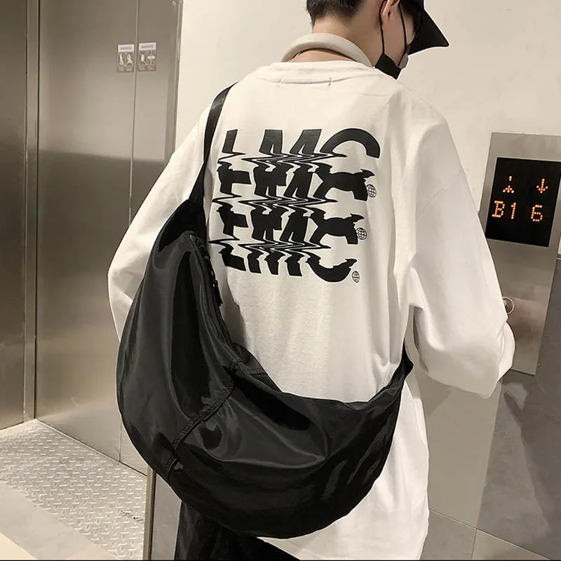 Single-Shoulder-Tasche New Street Trend Rucksack mit großer Kapazität Einfache Knödel tasche Modetrend Herren-und Damen-Umhängetasche