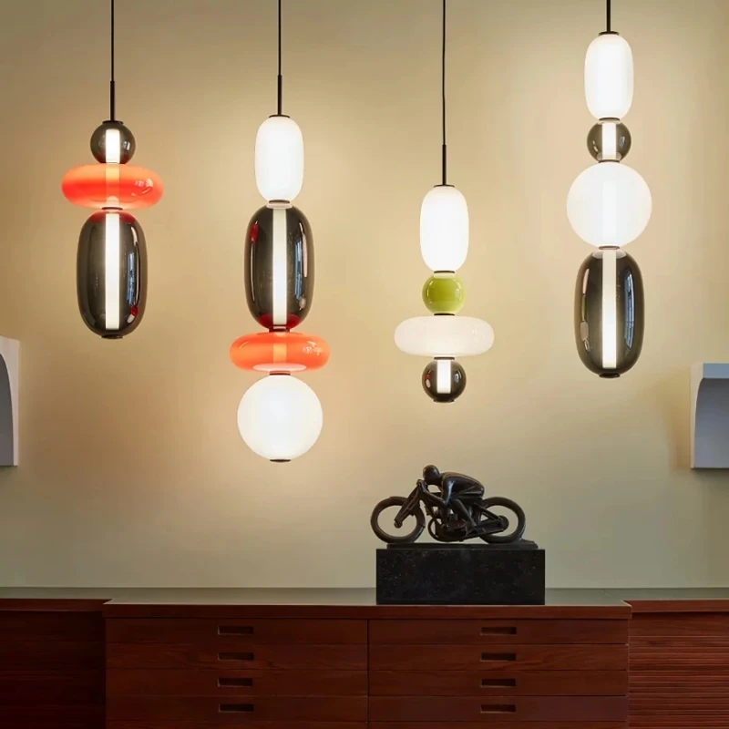 

Modern creative LED colored glass pendant light. Suitable for ceiling lights in villas, living rooms, bedrooms, and lobbies.