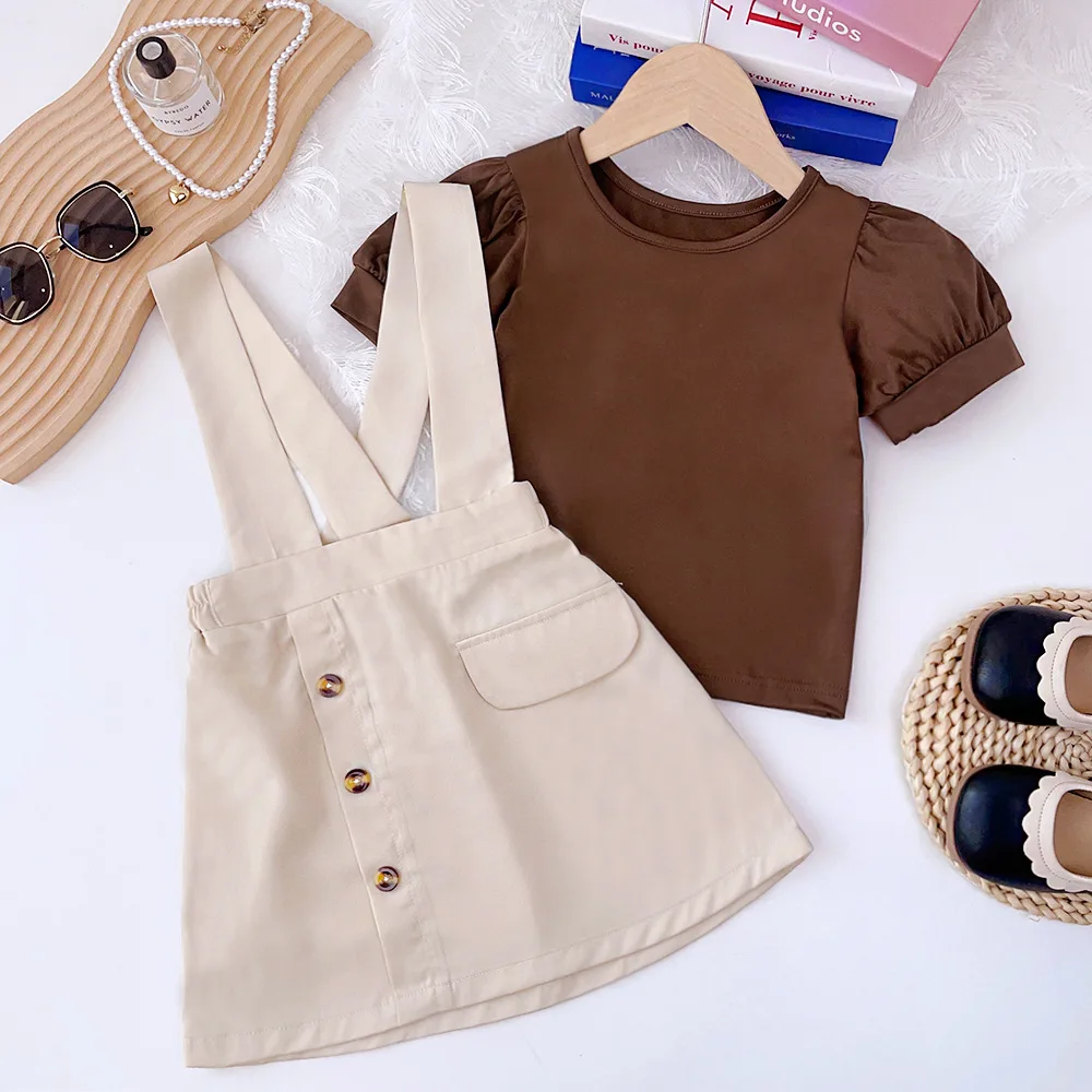 2024 New Child Clothes Sets Short Puff Sleeve O Neck Brown T-shirt Suspender Skirt 2 Piece Sets Designer Girls Clothes Set 3-7T