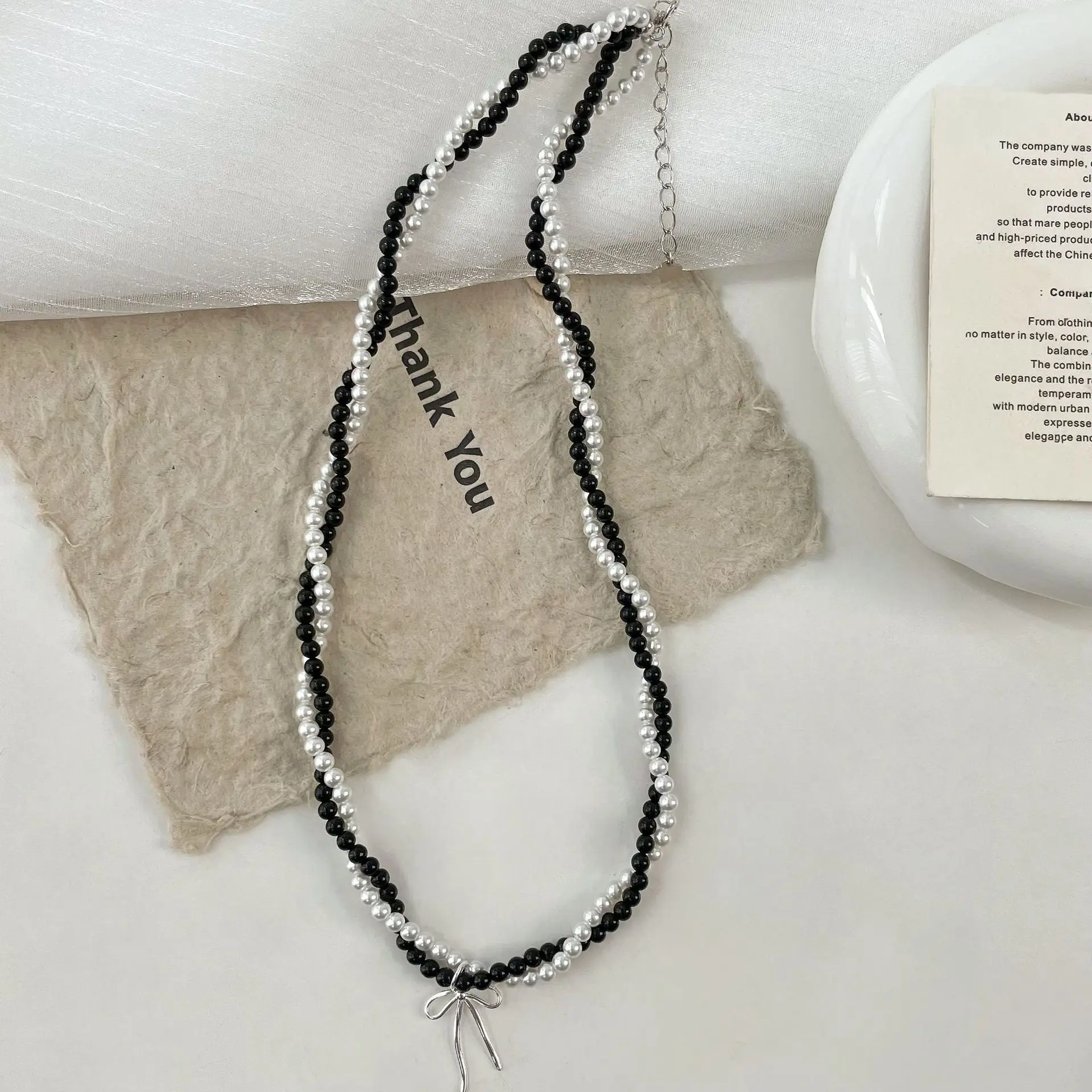 

S925 sterling silver double-layer agate pearl bow collarbone necklace ins temperament high-end minimalist niche