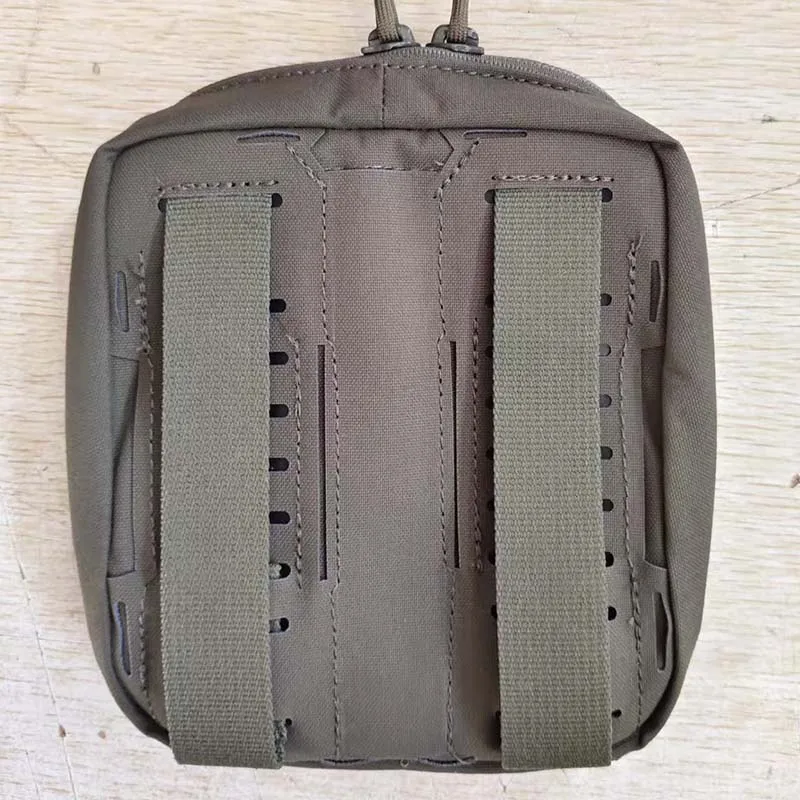Tactical folding storage pouch for outdoor use, functioning as a general-purpose (GP) waist bag or an NVG gear organizer.