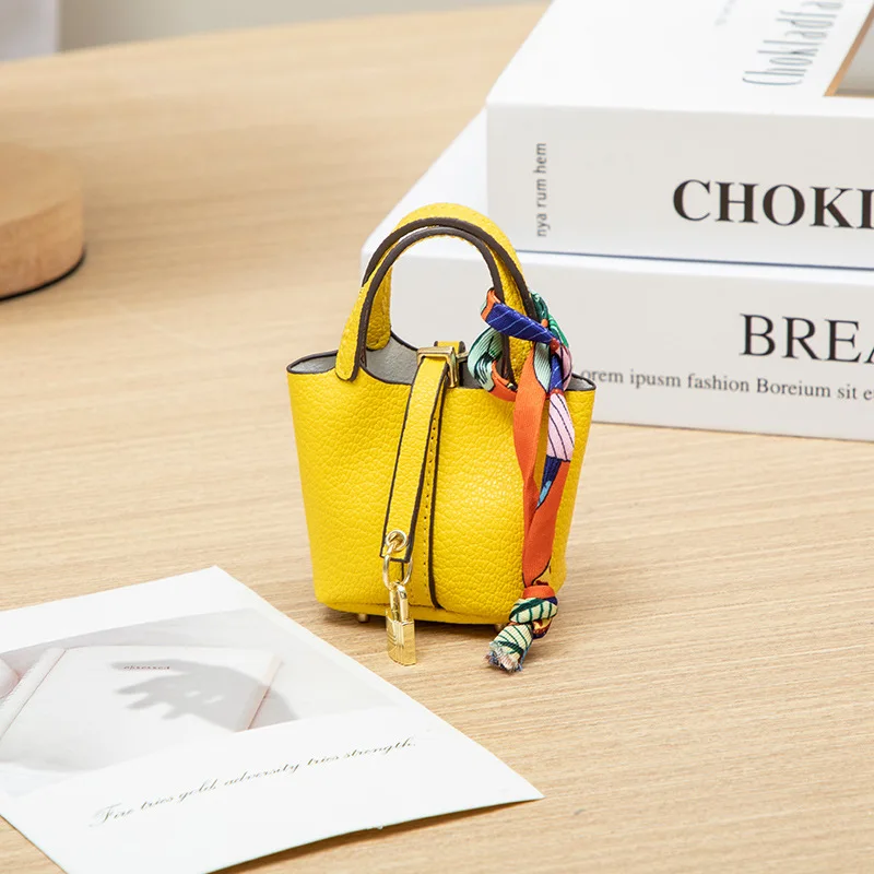 2026 Mini-Taschenanhänger Schlüsselanhänger Hängeaccessoire Zero Wallet Kreatives tragbares Armband Bluetooth-Kopfhörertasche Multifunktional – Detail 13