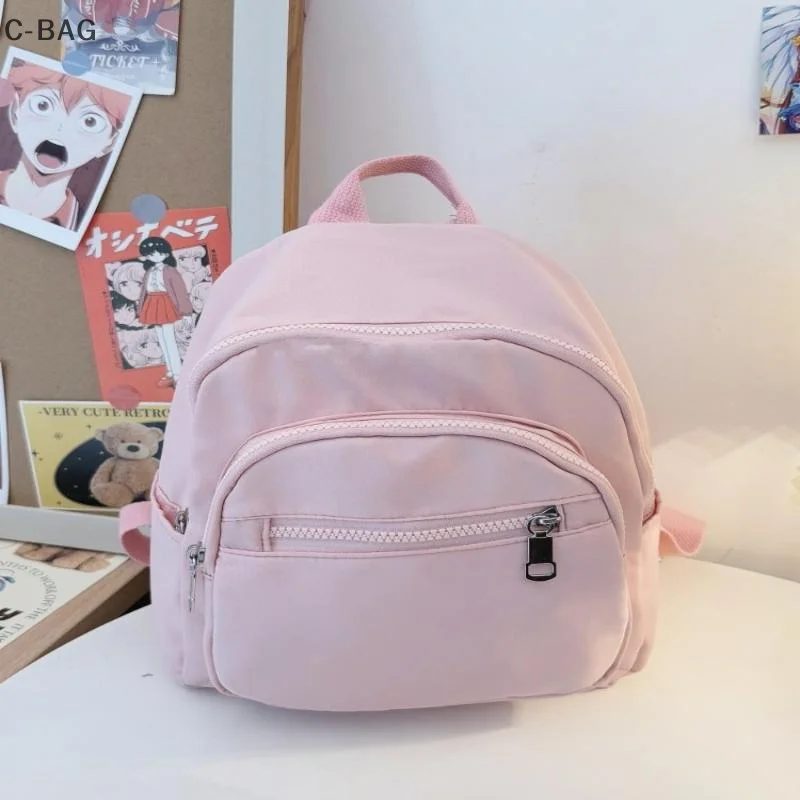 กระเป๋าเป้สะพายหลังขนาดเล็กสำหรับผู้หญิงอเนกประสงค์ กระเป๋าเดินทางน้ำหนักเบาขนาดกะทัดรัดพร้อมช่องใส่ของหลายช่อง