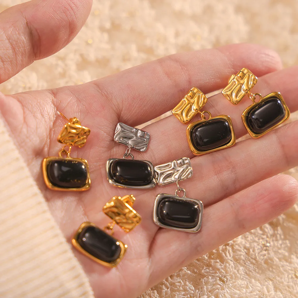 

Inlaid black glass design stainless steel gold-plated earrings